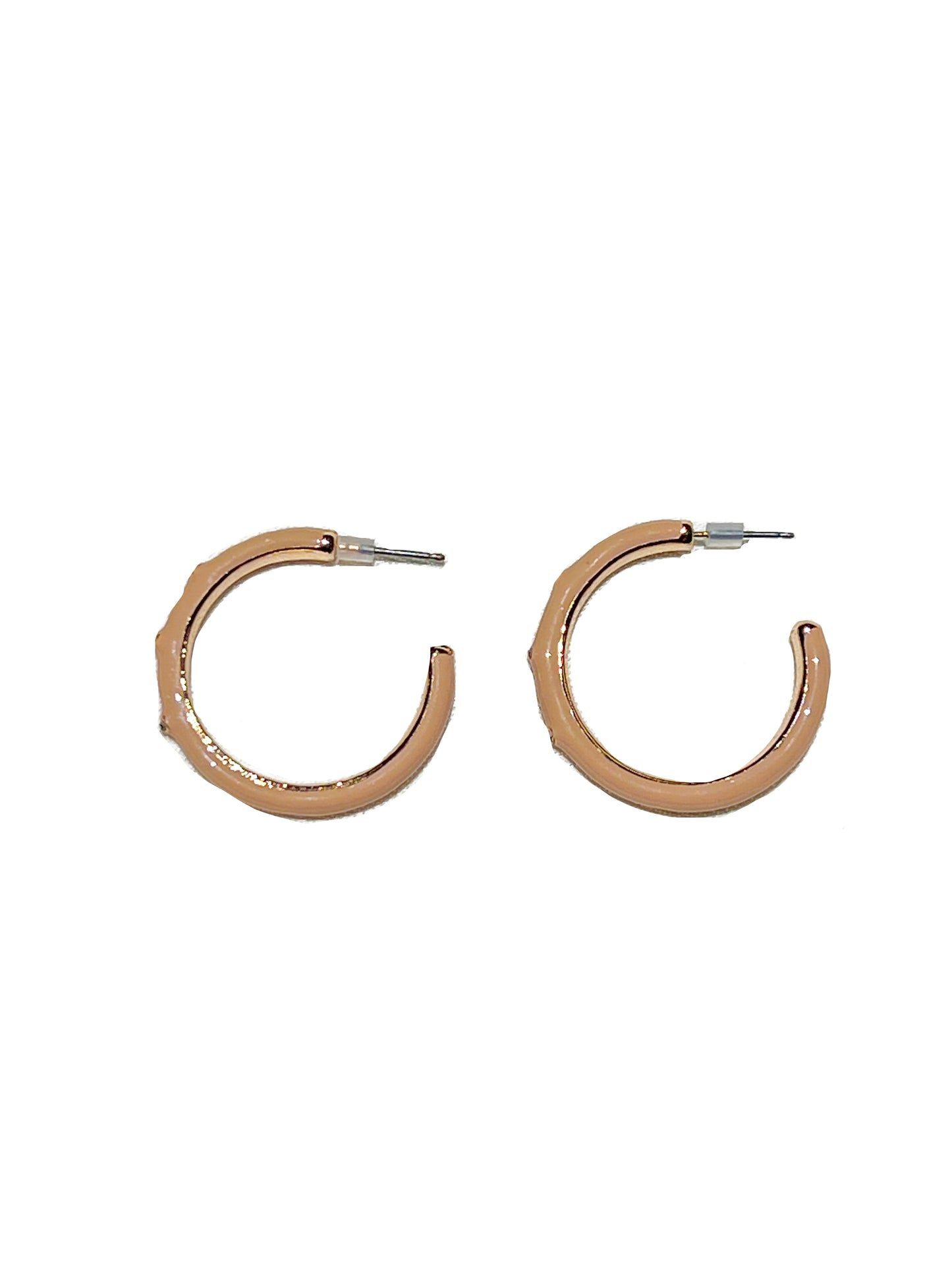 These nude Mini Hoop Earrings will have everyone starring! When your outfit feels like something is missing.. throw on this pair and call it a day. 1'' Long Plastic Backing Made in China.