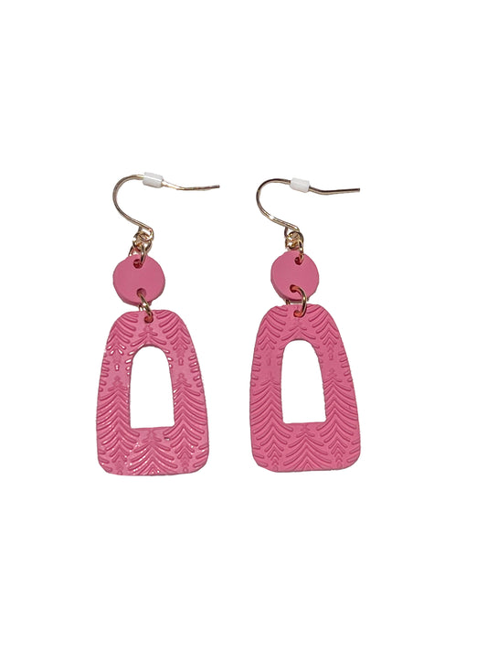 Standout in these Pink Geometric Drop Earrings! Lightweight with unique shape, making them the perfect addition to your look. Clay Material 2'' Long Plastic Backing Made in China.