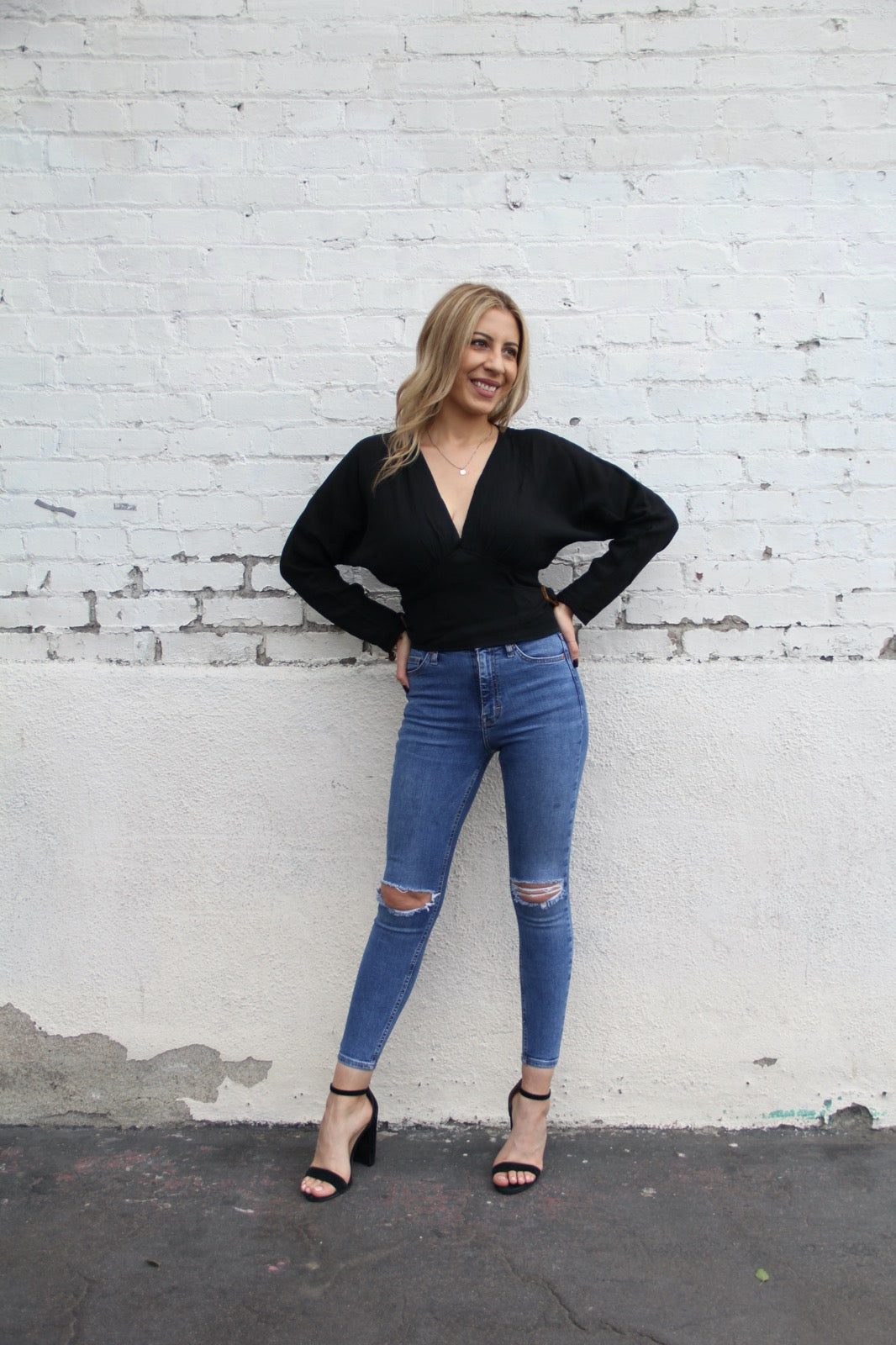 Shop our selection of women's black long sleeve tops for an everyday to night look. Smocked Back detail. Shop the latest arrivals of spring long sleeve tops100% Polyester Marble Buckle Detail V-Neck Smocked Back Black