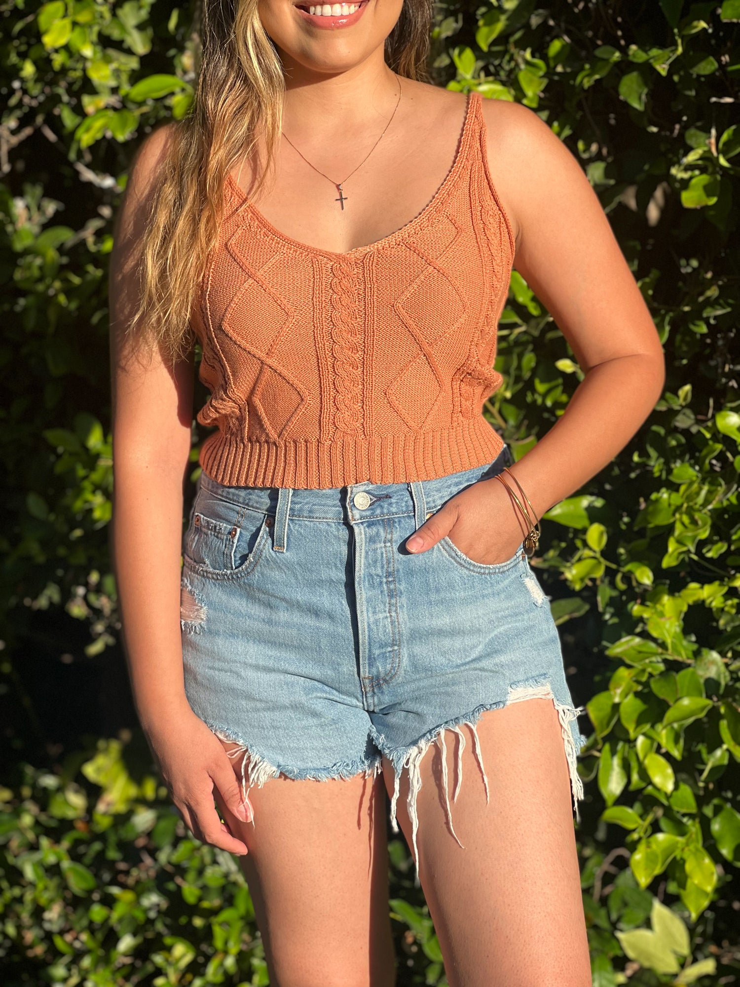 Sunrise Crochet Top comes in 2 colors. Crochet Top is a V-Neck. 100% Polyester. Perfect for the summer. Just throw on some shorts and you're ready to go!.