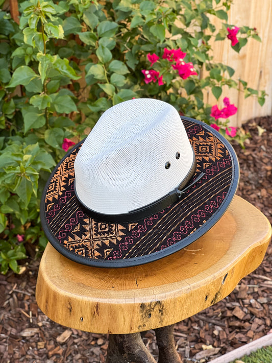 Our "Kick The Dust Fedora Hat" has a flat wide brim, unique geometric design, and black belt buckle detail. Make sure to rock these hats this fall season. Shop our hats collection at lazochic.com