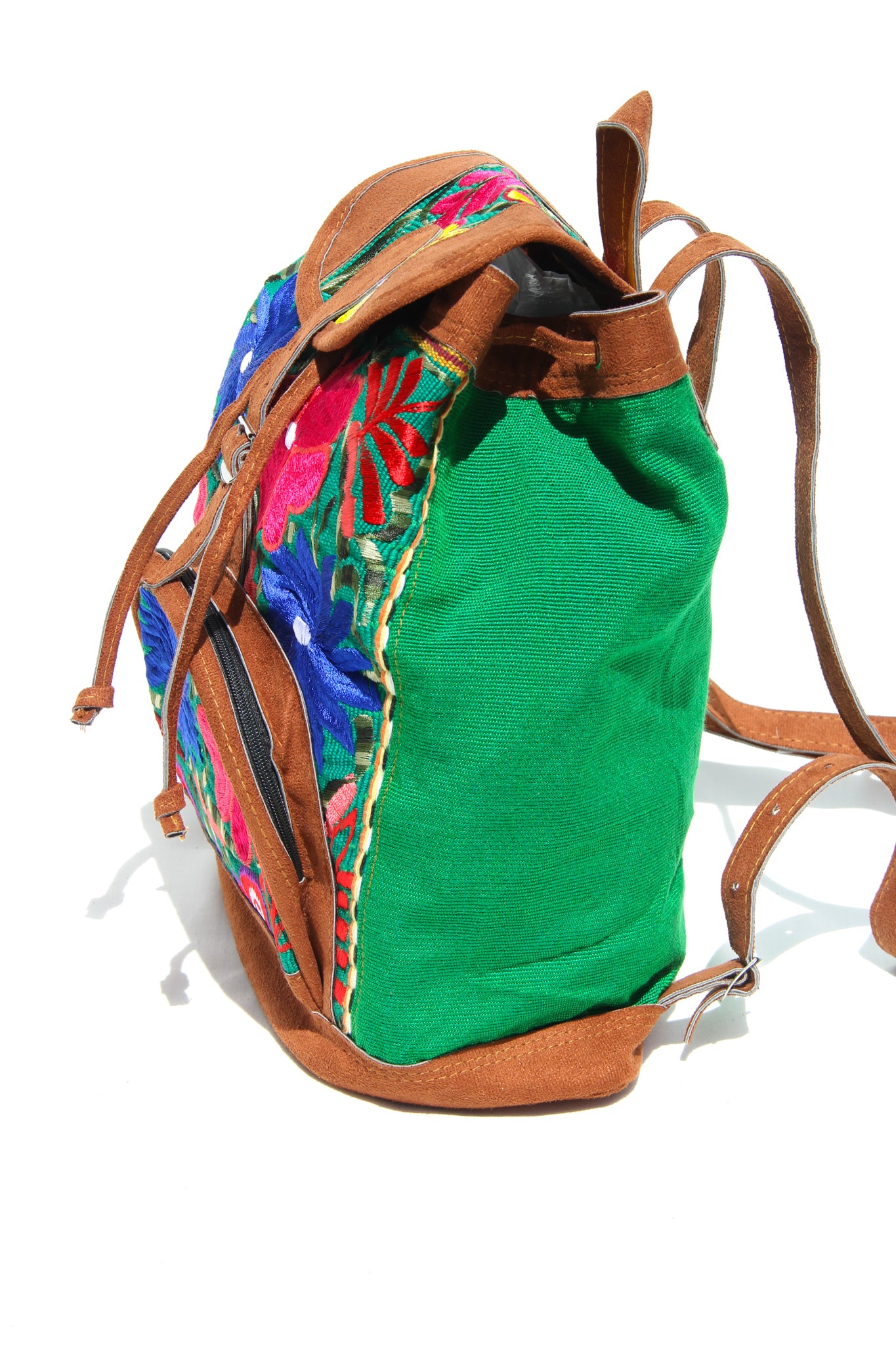 colorful huipil floral embroidery backpack green woven fabric and faux suede contrast with adjustable straps and front buckle closure with front zipper pocket the prefect travel, hiking or beach bag unique bag great for back to school take this bag on your next destination boho bag and hippie style bag a great standout accessories made in Guatemala