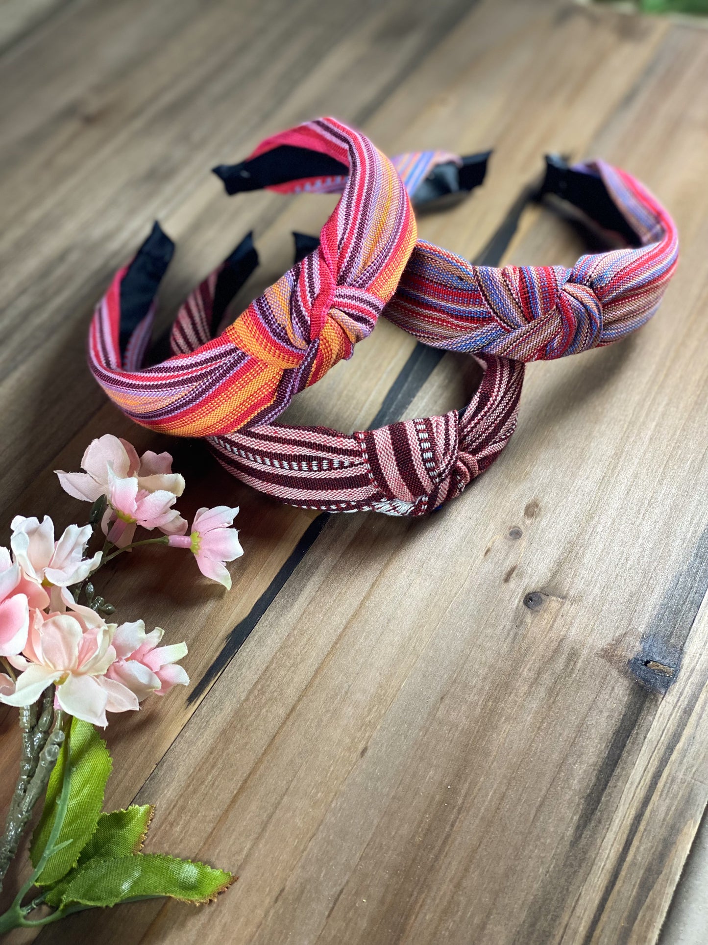 Jalapa Headbands. Handmade in Guatemala Handwoven Interacted Fabric Knotted Detail Available in 5 different styles. Perfect for that pop of color in summer! All these pink headbands are very comfortable and adjustable.