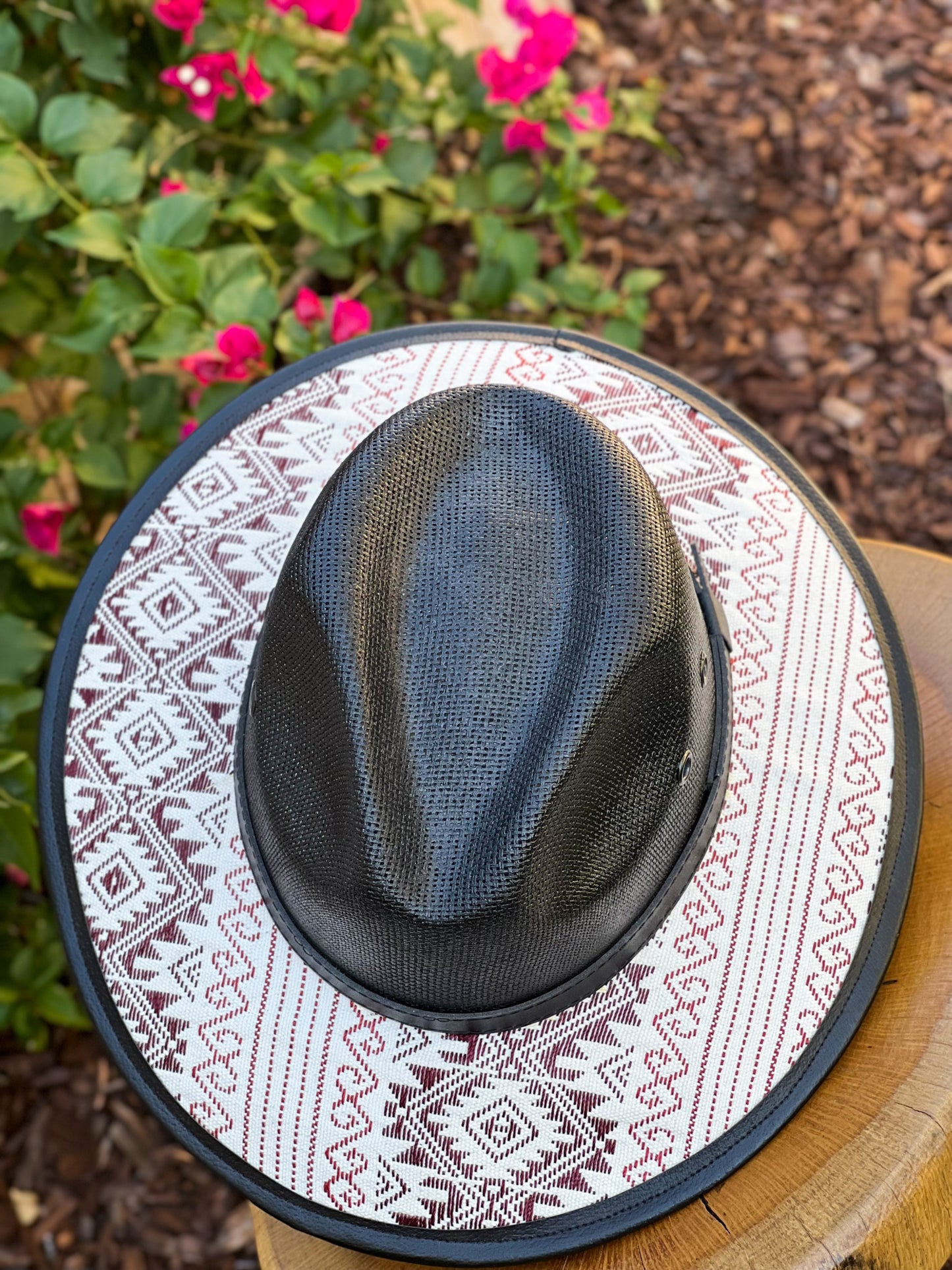 Our "Harvest Moon Fedora Hat" has a black leather top and flat wide brim. It has a geometric unique design that you can rock this season. Shop our hats collection at lazochic.com.