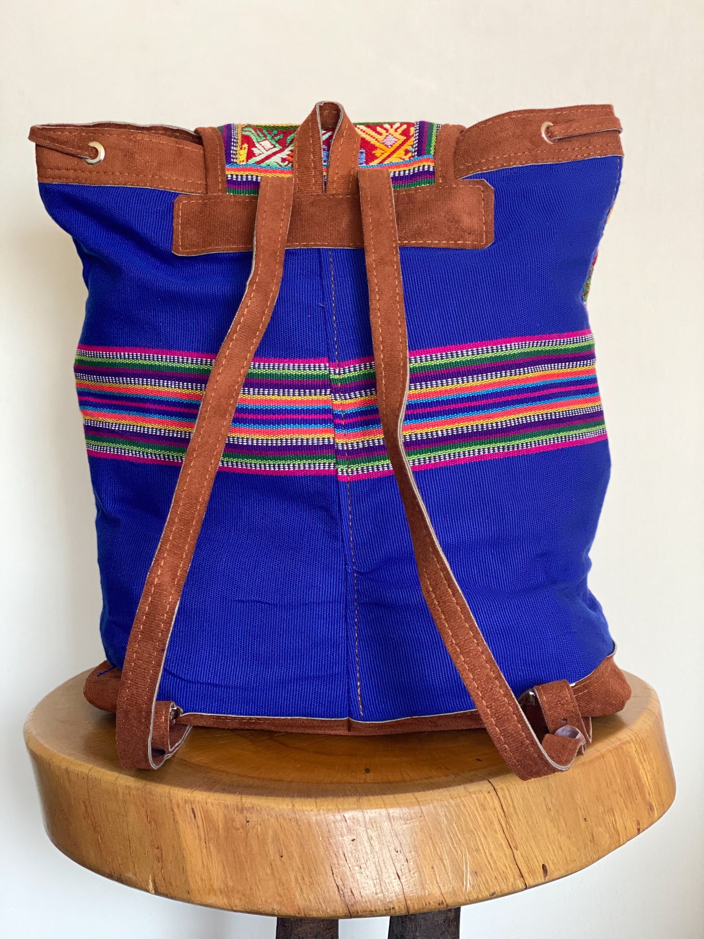 Handmade in Guatemala Handwoven Intricate Fabric Front Zipper Pocket Adjustable Straps Belt Buckle Closure.
