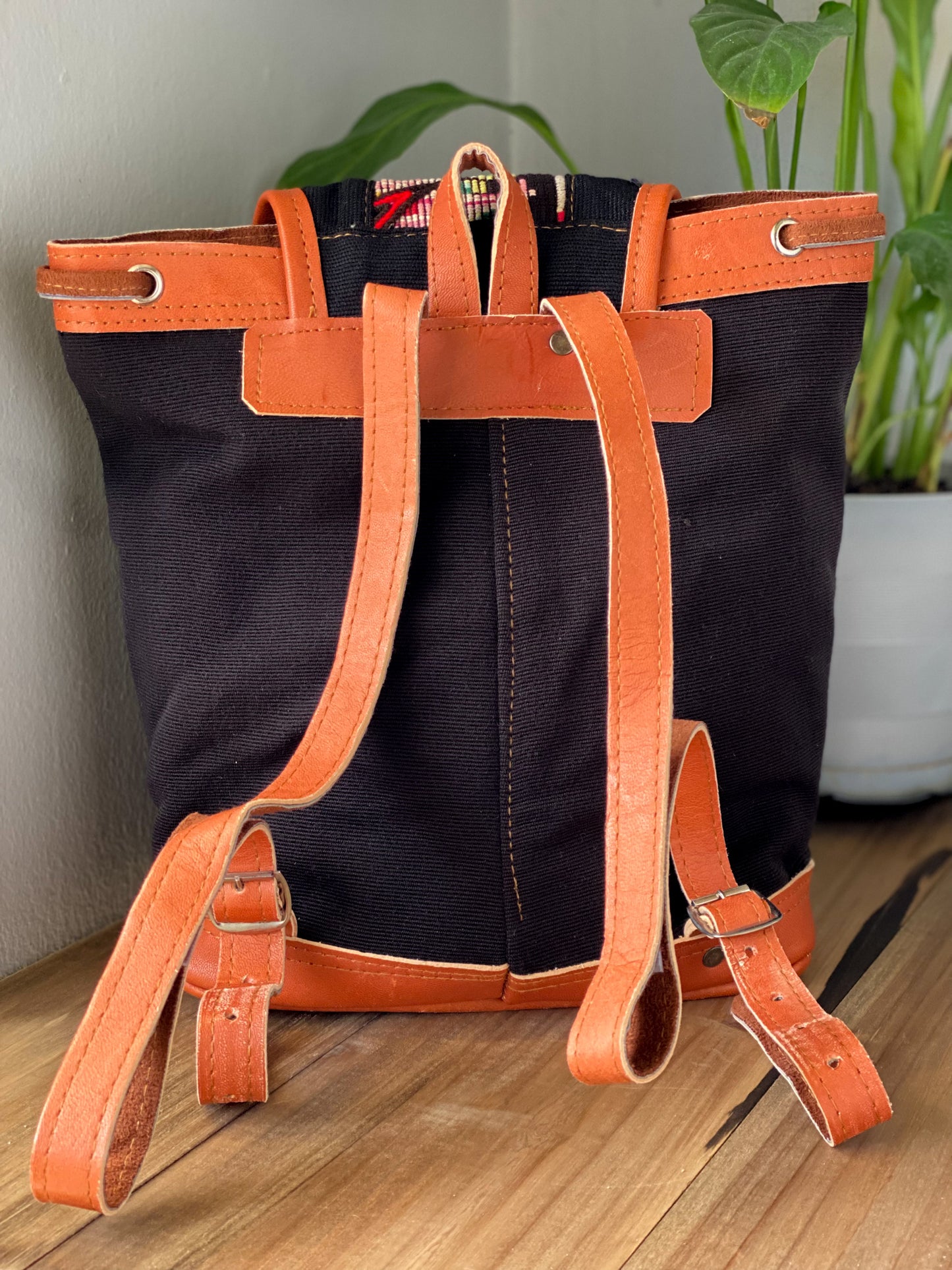 Handmade in Guatemala Handwoven Intricate Fabric Front Zipper Pocket Adjustable Straps Belt Buckle Closure Length 13” Width 11 1/2”.