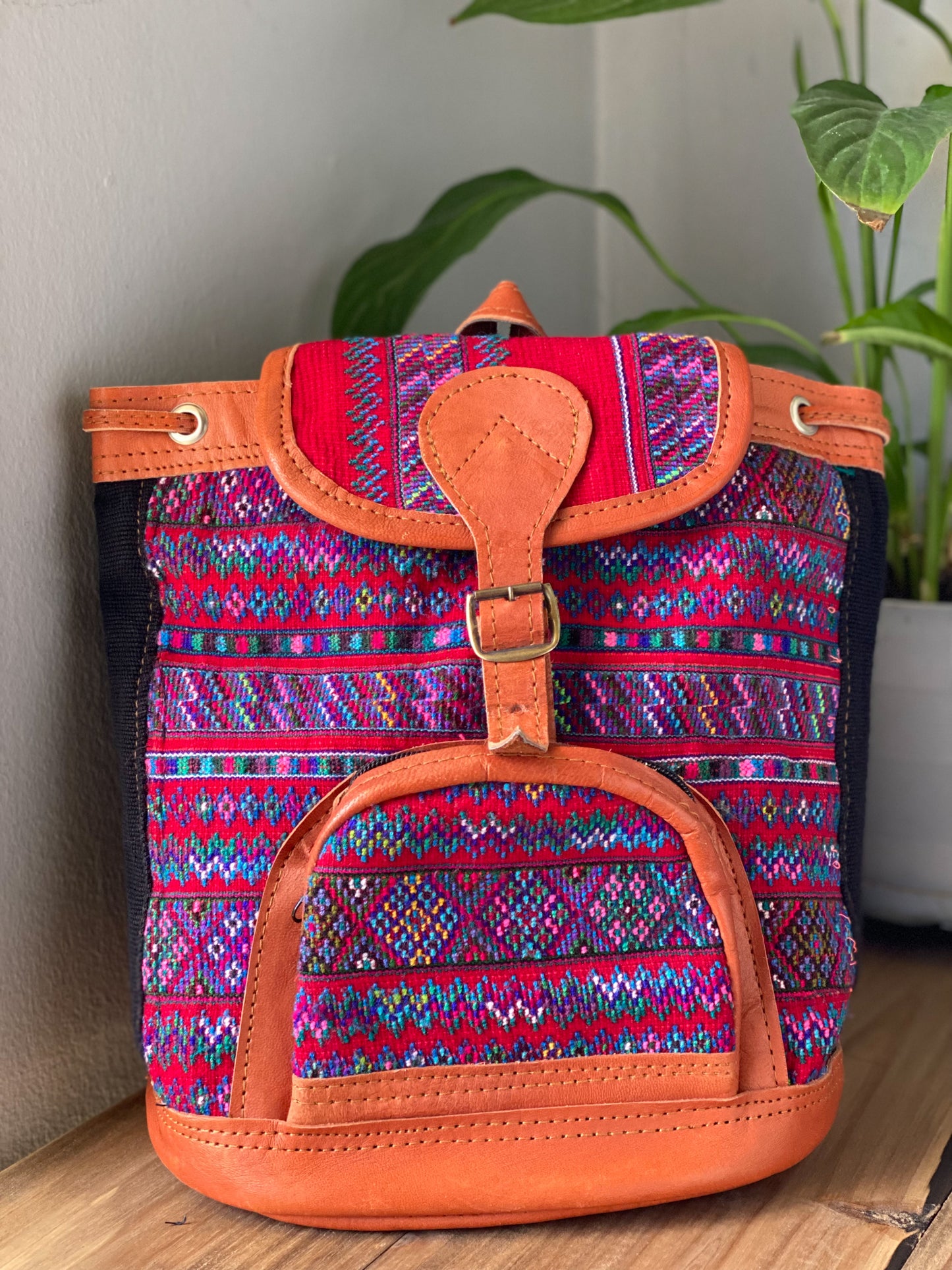 Handmade in Guatemala Handwoven Intricate Fabric Front Zipper Pocket Adjustable Straps Belt Buckle Closure Length 13” Width 11 1/2”.