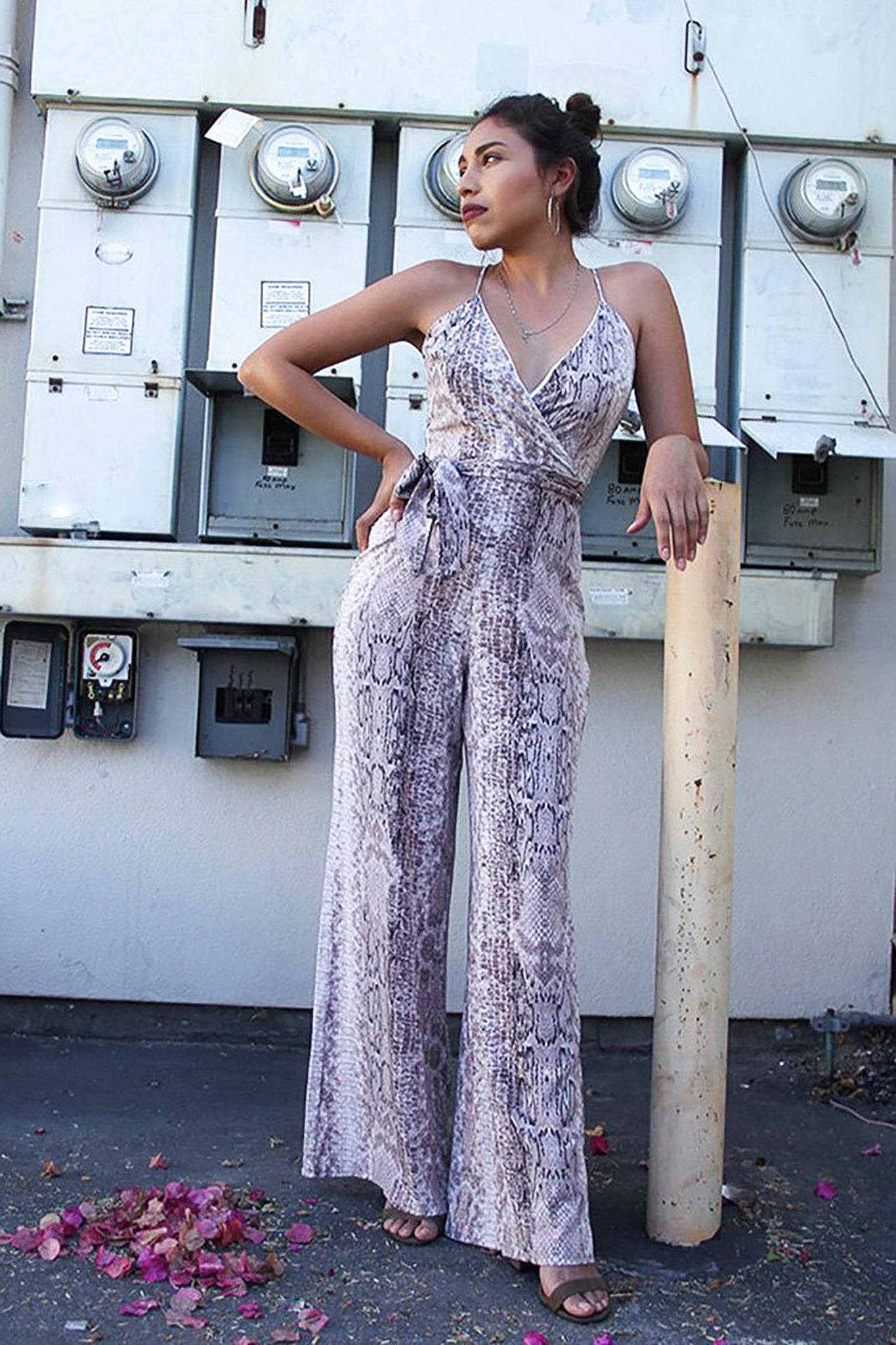 Women's Offers Trendy Snake Print Plunge Neck Jumpsuit. Made in USA. Great Stretch! Perfect for any special occasion. Back Zipper Closure. Spaghetti Straps. Wide Leg. Self Tie Belt. Shop for a variety of styles as www.lazochic.com 