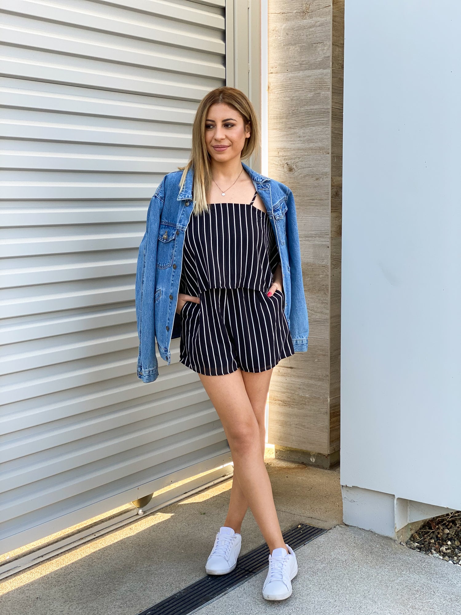 Women's trendy Black & White Striped Shoulder Cutout Romper. Adjustable Straps. Side Pockets and fully lined. Shop for a variety of styles at LazoChic.com
