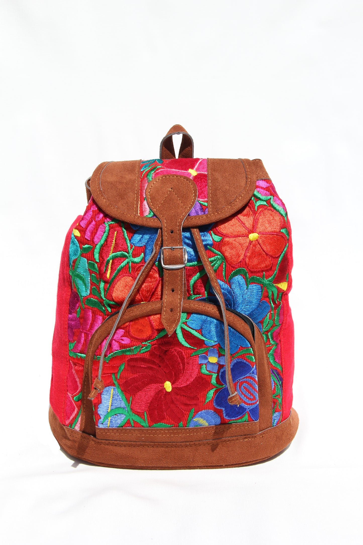 colorful huipil floral embroidery backpack with red woven fabric and faux suede contrast with adjustable straps and front buckle closure with front zipper pocket the prefect travel, hiking or beach bag unique bag great for back to school take this bag on your next destination boho bag and hippie style bag a great standout accessories made in Guatemala