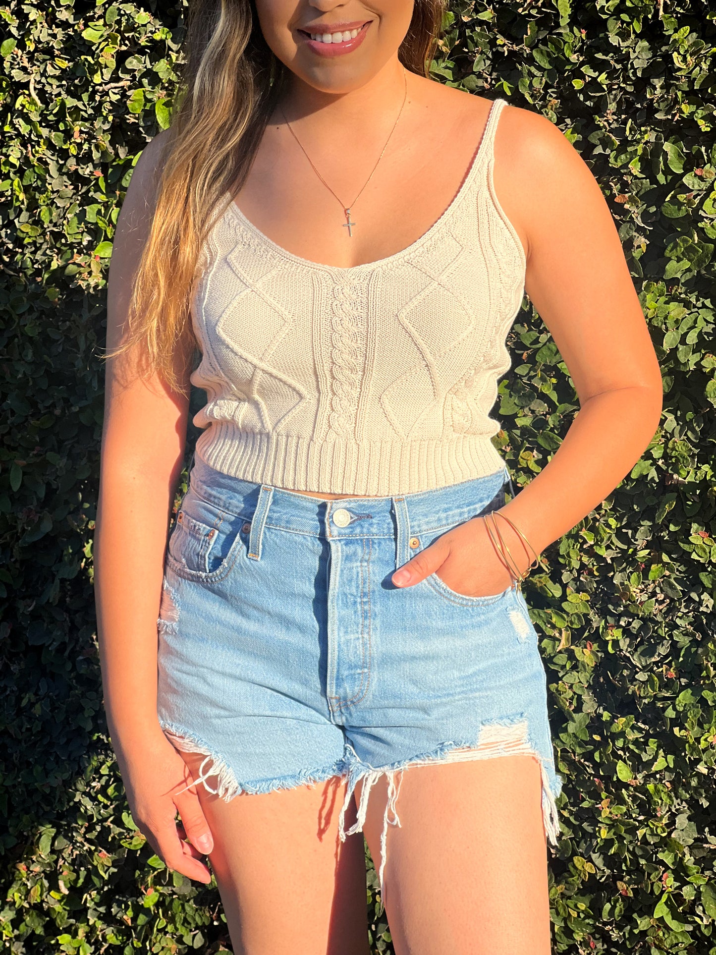 Sunrise Crochet Top is a Crochet Top. V-Neck. 100% Polyester. Perfect for the summer. Throw in on with a cute pair of shorts and you have a cute look!